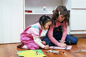 Coloring: Two Girls Coloring On Floor