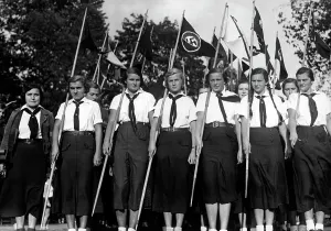 Upbringing: Girls with flags, 1937