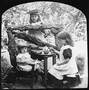 Smocks: Three girls having a tea party