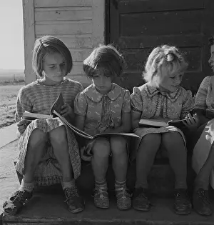 Malheur: Girls of Lincoln Bench School study their reading lesson. Ne