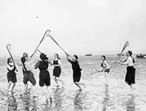 Racket: Girls playing on the beach, 1912