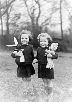 The Childrens Society: Two girls playing with their toys