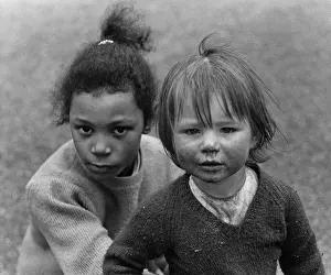Difference: Two girls in a street