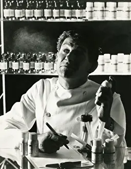 Pharmacist: Givaudan Ltd. - Chemist with bottle and aerosol can