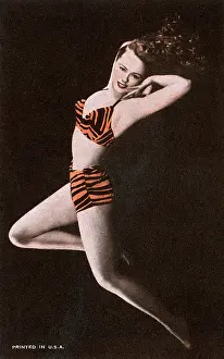 Two Piece: Glamorous American model in tiger-print bikini