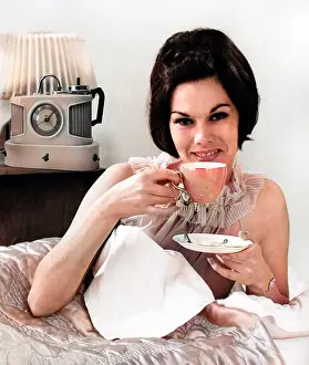 Nightie: A glamorous female model with her trusty Goblin Teasmade