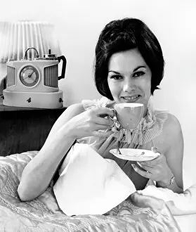 Nightie: A glamorous female model with her trusty Goblin Teasmade