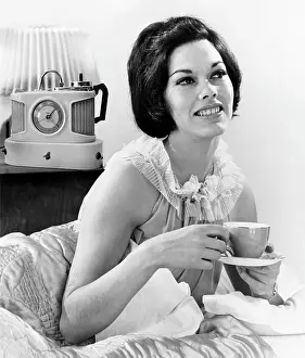 Nightie: A glamorous female model with her trusty Goblin Teasmade