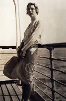 Onboard: Glamorous lady on the deck of the deck of an ocean liner