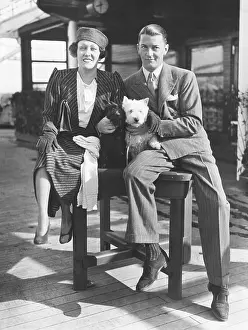 1347: Gloria Swanson with her husband, Michael farmer