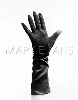 Gloved: A GLOVED HAND