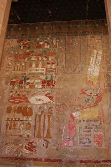 Bahri: The god Amon, sitting at a table of offerings. Temple of Hat