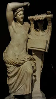 Olympian: God Apollo playing the cithara. 2nd century AD. Marble