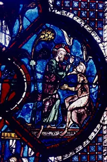 Samaritan: God creating Adam. Chatres Cathedral stained glass