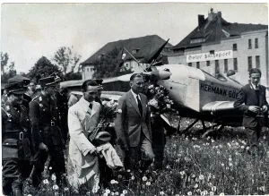 Goerings: Goebbels walking by a plane named Hermann Goering