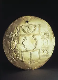 Shaman: Gold breastplate with schematic figure of a man