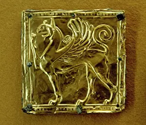 Gryphon: Gold plate depicting a winged griffin. 6th century B.C. Delp