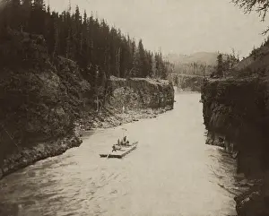 Downstream: Gold seekers on a scow passing through the