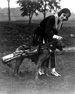 Caddie: Golfer and canine caddie