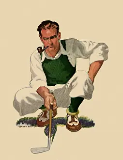 Golfer: Golfer sizes up Position on Green