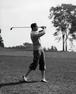 Teeing: Golfer taking a swing