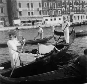 Oars: Gondoliers in Venice, Italy