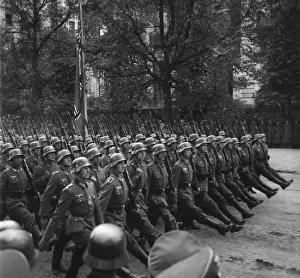 Tntarlcgr: Goose-stepping German troops in a Victory parade