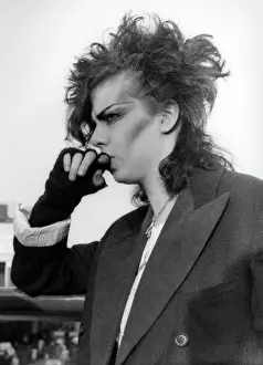 Distinctive: Goth girl in heavy makeup