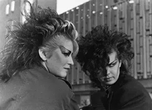 Distinctive: Two goth girls in heavy makeup