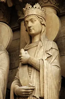 Crowned: Gothic Art. France. Paris. Sculpture on the facade of Notre