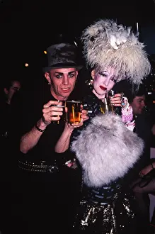Impress: Gothic Punk Couple at a Party