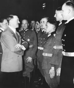 Graduate: Graduates of the officer class 1938 are received by Adol