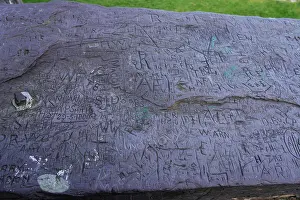 Llanberis: Graffiti on slate panels at Dolbadarn Castle, North Wales