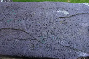 Llanberis: Graffiti on slate panels at Dolbadarn Castle, North Wales