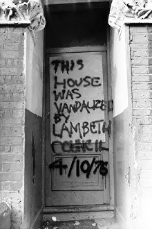 Lambeth: Graffitti on front door, Lambeth, South London