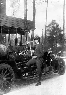 Grammar: Grammar school boy as a firefighter, 1917