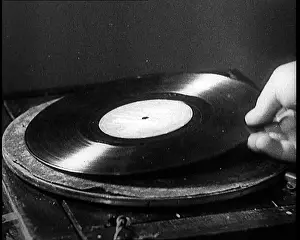 Turntable: Gramophone Shellac Record Being Placed on a Turntable