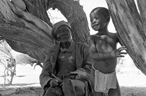Grandsons: Grandfather talks while grandson listens