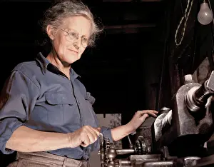 Grandmother: A grandmother cutting gears in her garage