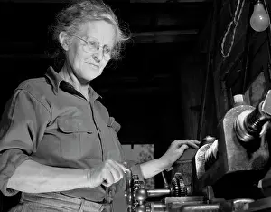 Grandmother: A grandmother cutting gears in her garage