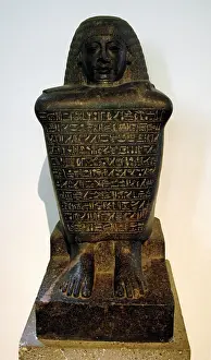 Amenhotep: Granodiorite block-statue of Amenhotep. 18th Dynasty. New Ki