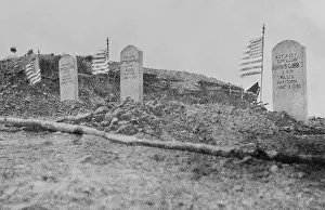 Tombstones: Graves of three of the six Marines killed in the