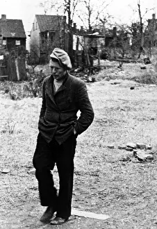 Vacant: The Great Depression. A poor man walking through