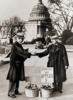 Recession: The Great Depression. Unemployed man sells ?