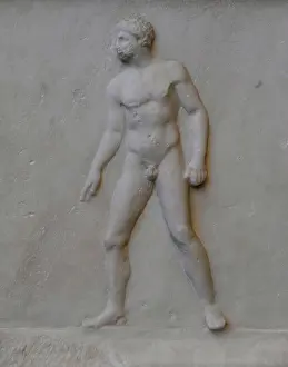 Thrower: Greek art. Relief from a statue base with spear thrower afte