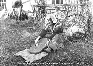 Corn: Grinding Corn With a Saddle Quern, Co. Antrim
