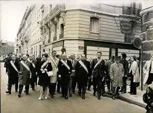 Sashes: Gros, Defferre, Boulloche, Mitterrand in street protest