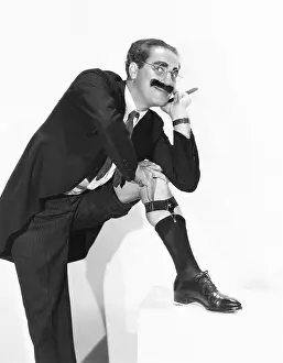Enticing: Groucho Marx strikes an alluring pose