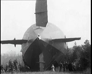 Crowding: A Grounded Zeppelin Airship With People Crowding