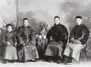 Affluent: Group of affluent Chinese men with a boy